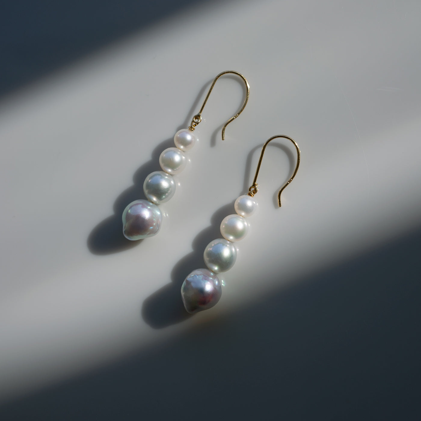 Graduated Pearl Stick Hook Earrings