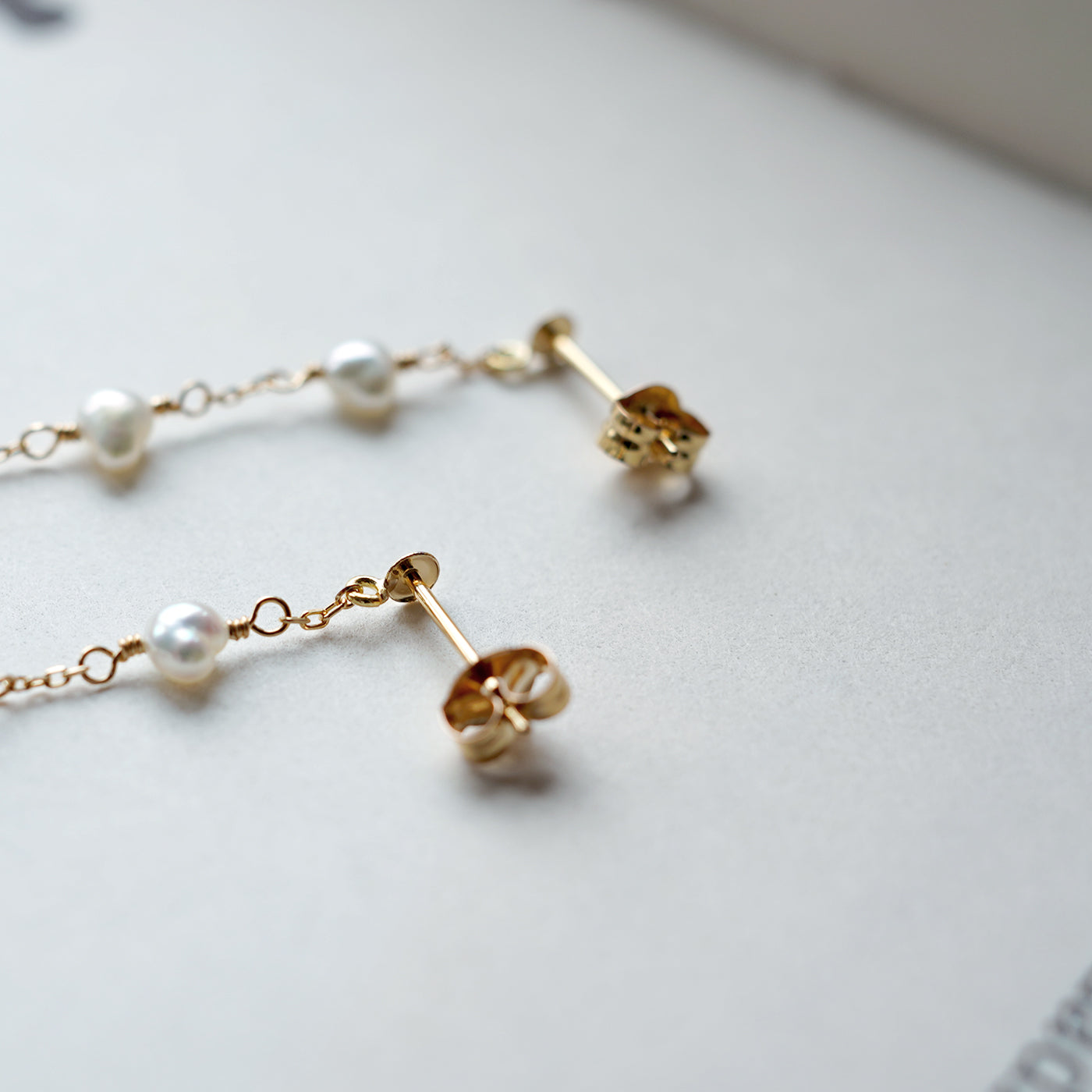Pearl Station Pierced Earrings - Akoya Keshi